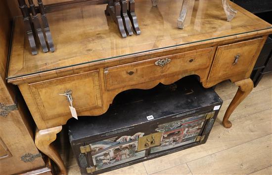 A 1920s Queen Anne style figured walnut kneehole dressing table W.122cm